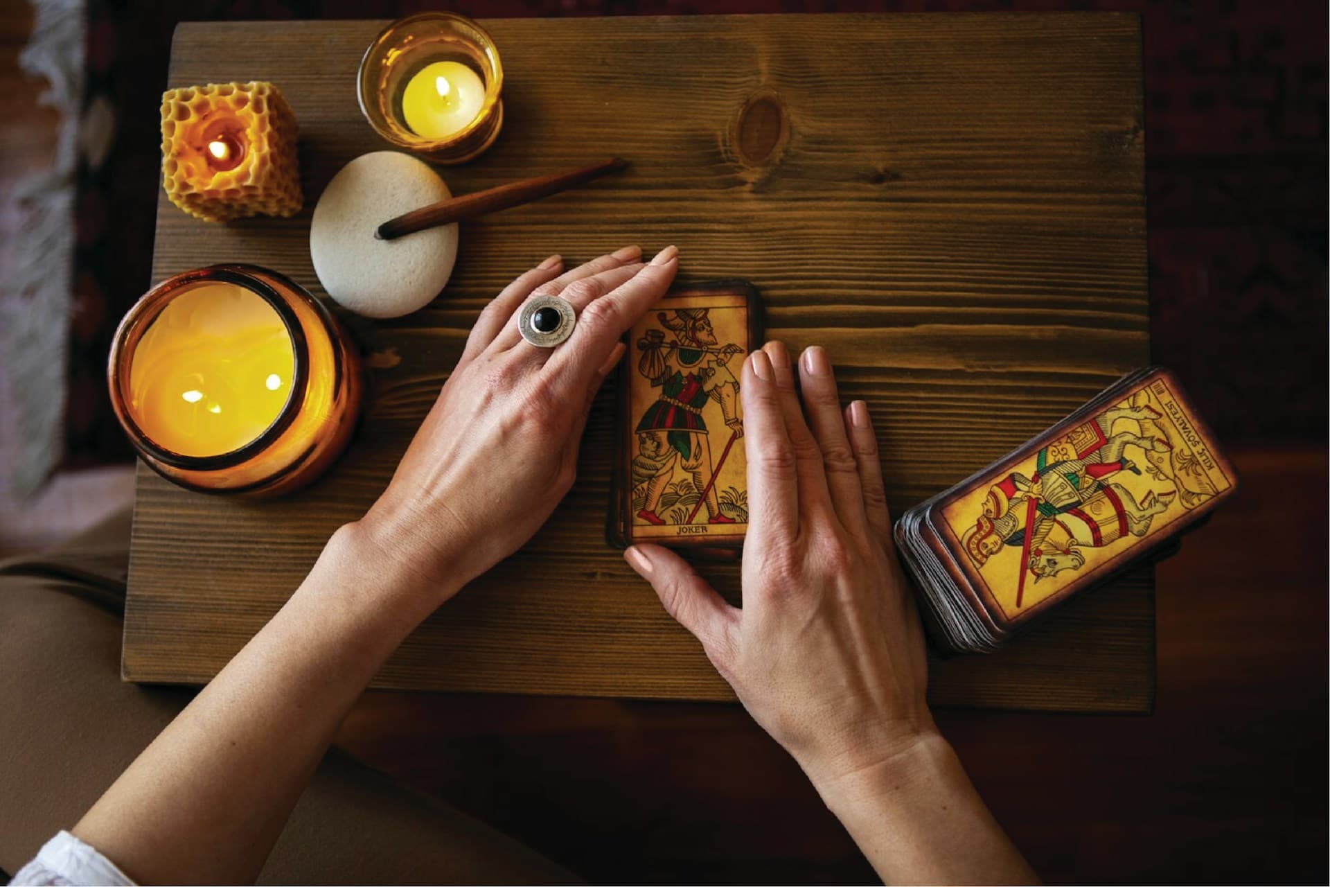 A stack of tarot cards on a table